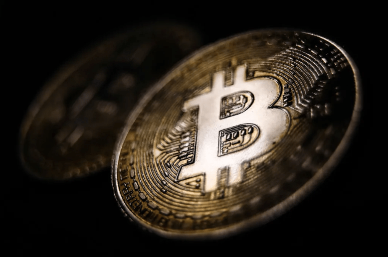 造富神话破灭：比特币投资者 2022 年血亏 1950 亿美元